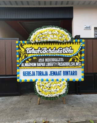 Papan Bunga Duka di Sidomulyo Timur
